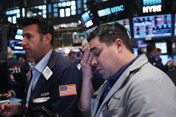 NEW YORK, NY - JUNE 24: Traders work on the floor of the New York Stock Exchange (NYSE) following news that the United Kingdom has voted to leave the European Union on June 24, 2016 in New York City. The Dow Jones industrial average quickly fell nealy 500 points on the news with markets around the globe plunging. (Photo by Spencer Platt/Getty Images)