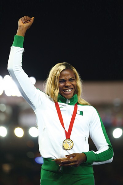 GLASGOW, SCOTLAND - JULY 31: Gold medallist Blessing Okagbare of Nigeria on the podium during the medal ceremony for the Women?s 200 metres at Hampden Park during day eight of the Glasgow 2014 Commonwealth Games on July 31, 2014 in Glasgow, United Kingdom. (Photo by Richard Heathcote/Getty Images)